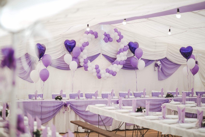 Elegant purple and white balloon decoration for an event in Sector 62 Noida